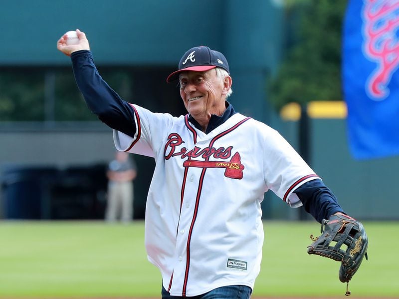 Braves great Phil Niekro throws out the ceremonial first pitch before the game. Curtis Compton/ccompton@ajc.com