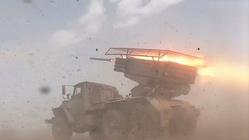 In this photo taken from a video released by the Russian Defense Ministry press service on Thursday, Sept. 26, 2024, a Russian BM-21 Grad self-propelled 122 mm multiple rocket launcher fires on an undisclosed location in Ukraine. (Russian Defense Ministry Press Service via AP)