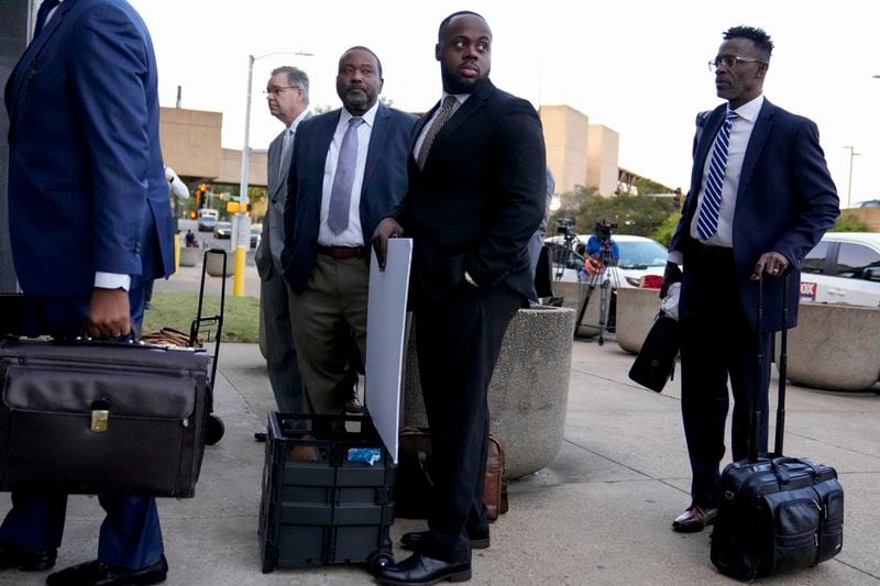 Former Memphis police officer Tadarrius Bean, second from right, arrives at the federal courthouse before the start of jury selection of the trial in the Tyre Nichols case Monday, Sept. 9, 2024, in Memphis. (AP Photo/George Walker IV)