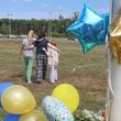 Mourners pay tribute to Apalachee High School shooting victims. (John Spink/AJC)