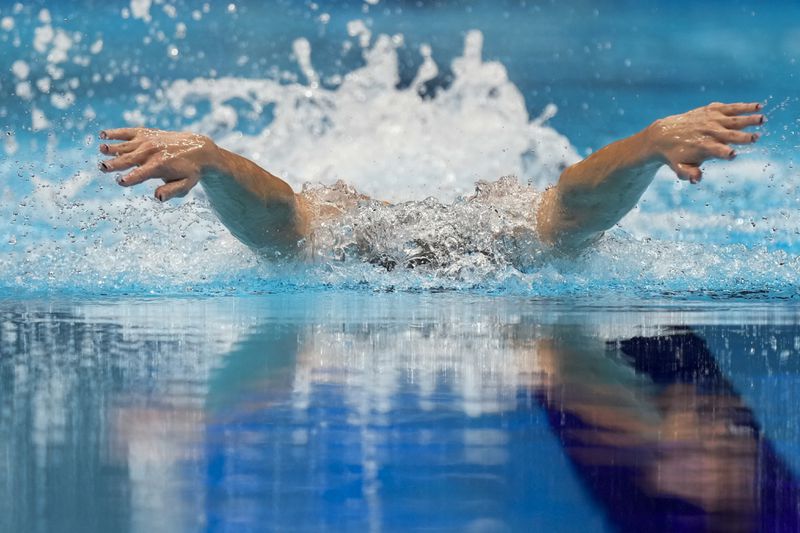 Kate Douglass swims during the Women's 200 individual medley semifinals heat Friday, June 21, 2024, at the US Swimming Olympic Trials in Indianapolis. (AP Photo/Michael Conroy)