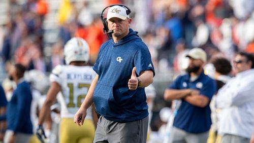 Georgia Tech coach Brent key gives a thumbs up during the second half of an NCAA college football game against Virginia Saturday, Nov. 4, 2023, in Charlottesville, Va. (AP Photo/Mike Caudill)