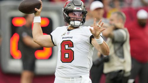 Tampa Bay Buccaneers quarterback Baker Mayfield (6) warms up before a pre season NFL football game against the Miami Dolphins, Friday, Aug. 23, 2024, in Tampa, Fla. (AP Photo/Chris O'Meara)