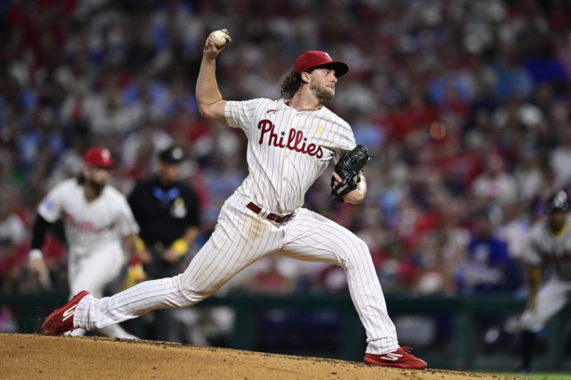 Philadelphia Phillies' Aaron Nola throws during the fourth inning of a baseball game against the Atlanta Braves, Sunday, Sept. 1, 2024, in Philadelphia. (AP Photo/Derik Hamilton)