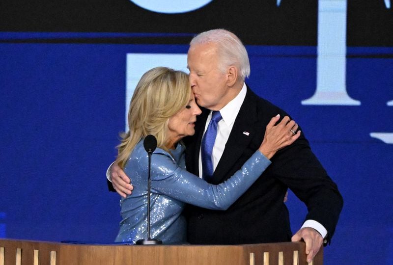 President Joe Biden kisses first lady Jill Biden on stage at the DNC.