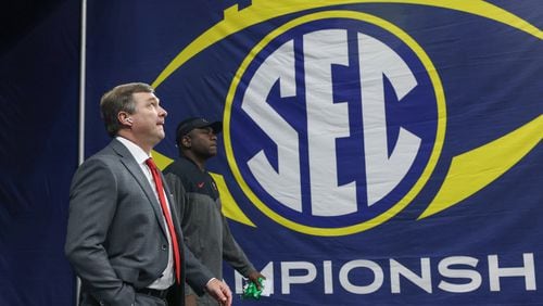 Georgia Bulldogs head coach Kirby Smart enters the Mercedes-Benz Stadium for the SEC Championship Game against the LSU Tigers in Atlanta on Saturday, Dec. 3, 2022. (Jason Getz/The Atlanta Journal-Constitution/TNS)