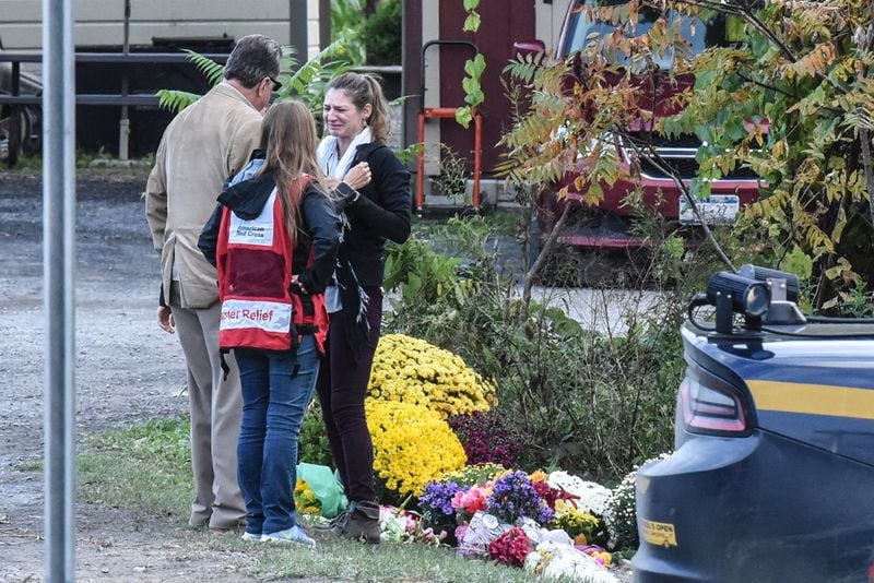 SCOHARIE, NY - Oct. 8: People mourn at the site of the fatal limousine crash  in Schoharie, N.Y.  (Photo by Stephanie Keith/Getty Images)  