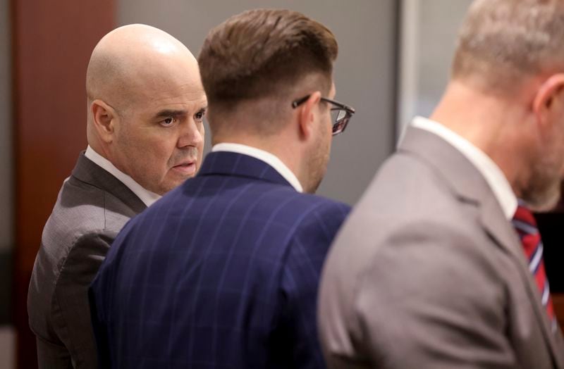 Robert Telles, left, listens in court with his attorneys Robert Draskovich, right, and Michael Horvath, prior to jury selection on the second day of his murder trial at the Regional Justice Center in Las Vegas Tuesday, Aug. 13, 2024. Telles, a former Clark County public administrator, is charged in the murder of Las Vegas Review-Journal investigative journalist Jeff German. (K.M. Cannon/Las Vegas Review-Journal via AP, Pool)