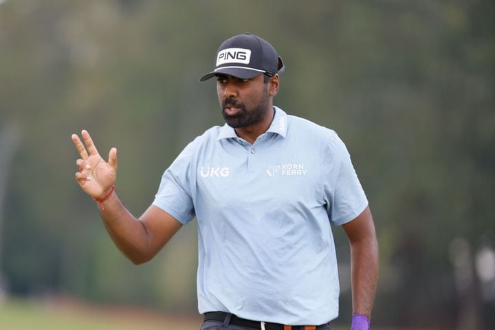 Sahith Theegala reacts after his putt on the seventh green during the final round of the Tour Championship at East Lake Golf Club, Sunday, Sept. 1, 2024, in Atlanta. 
(Miguel Martinez / AJC)
