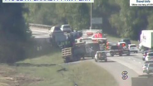 A crash blocked most lanes and caused heavy delays of I-75 southbound Friday, April 29, 2016, at Barrett Parkway. (Credit: WSB 24-hour Traffic Center)