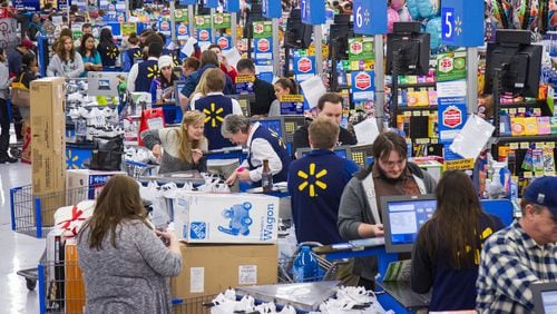 Shoppers purchase items for the holidays.