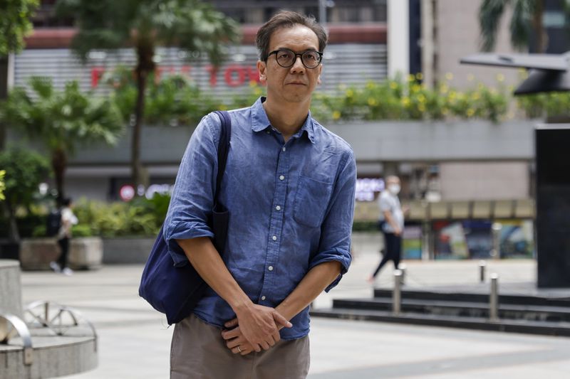 Chung Pui-kuen, the former chief editor of Hong Kong's now shuttered pro-democracy news outlet Stand News, arrives at the Wanchai District Court ahead of the final sentencing of Stand News sedition case in Wan Chai district court in Hong Kong on Thursday, Sept. 26, 2024. (AP Photo/May James)