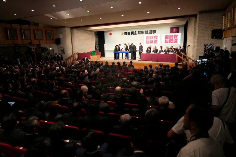 Officials count ballots during the ruling Liberal Democratic Party's (LDP) leadership election at the party headquarters Friday, Sept. 27, 2024, in Tokyo. (AP Photo/Hiro Komae, Pool)