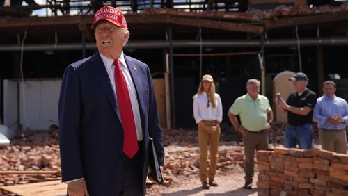 Republican presidential nominee former President Donald Trump speaks as he visits downtown Valdosta, Ga., a town that was impacted by Hurricane Helene, Monday, Sept. 30, 2024. (AP Photo/Evan Vucci)