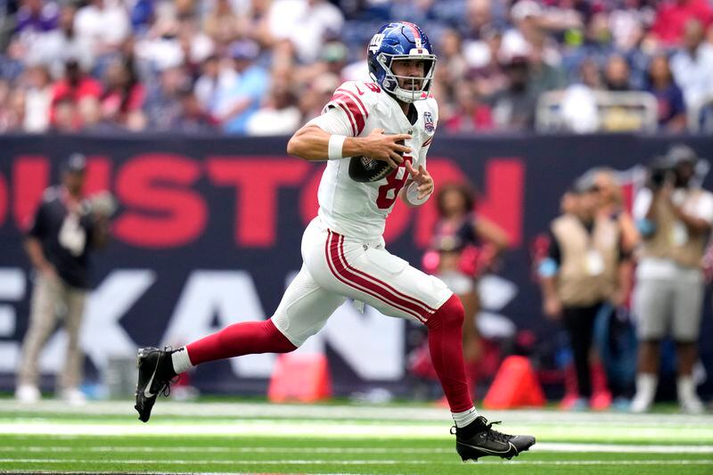 New York Giants quarterback Daniel Jones (8) runs the ball in the first half of a preseason NFL football game against the Houston Texans, Saturday, Aug. 17, 2024, in Houston. (AP Photo/Eric Gay)