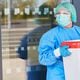 A healthcare worker carries organ for donation in a cooler. (Robert Kneschke/Dreamstime/TNS)