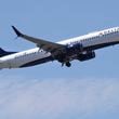 FILE- In this May 24, 2018, file photo a Delta Air Lines passenger jet plane, a Boeing 737-900 model, approaches Logan Airport in Boston. (AP Photo/Charles Krupa, File)