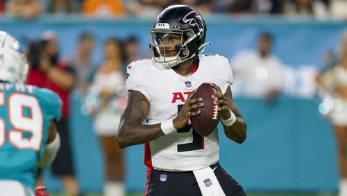 Atlanta Falcons quarterback Michael Penix Jr. (9) looks to throw the ball during an NFL pre-season football game against the Miami Dolphins, Friday, Aug. 9, 2024, in Miami Gardens, Fla. (AP Photo/Doug Murray)