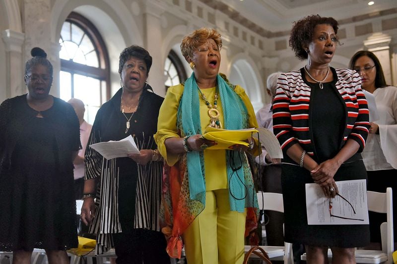 September 18, 2019 Atlanta - Family members of Porter Tunrer, a taxi driver who was lynched by the KKK in 1945, sing along at the Interfaith Service on Wednesday at the DeKalb History Center inside the Historic Courthouse. RYON HORNE/RHORNE@AJC.COM