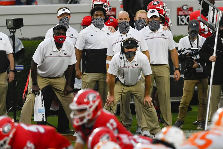 Georgia head coach Kirby Smart bends and watches the offense in red zone during the second half of a football game against Tennessee on Saturday, Oct. 10, 2020, at Sanford Stadium in Athens. Georgia won 44-21. JOHN AMIS FOR THE ATLANTA JOURNAL- CONSTITUTION