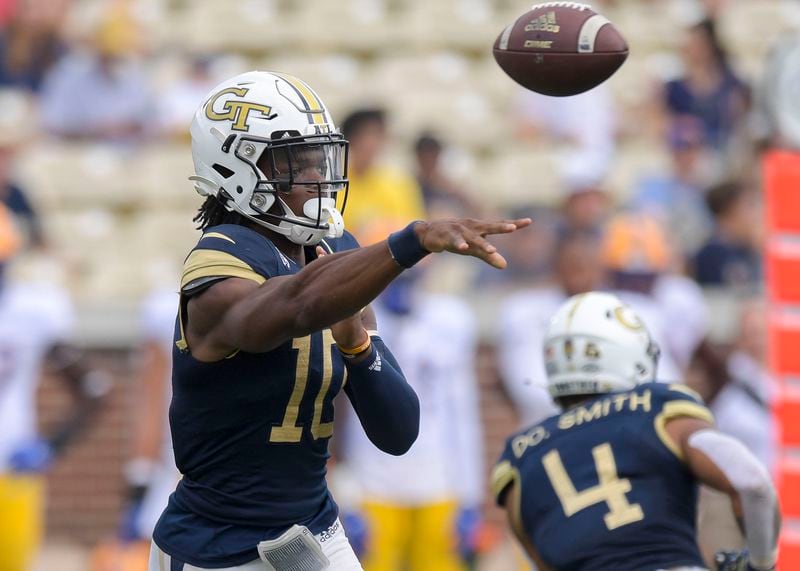 Yellow Jacket quarterback Jeff Sims completes a pass in the second half of play during a NCAA college football game Saturday, Oct. 2, 2021 at Bobby Dodd Stadium in Atlanta. (Daniel Varnado/For the AJC)