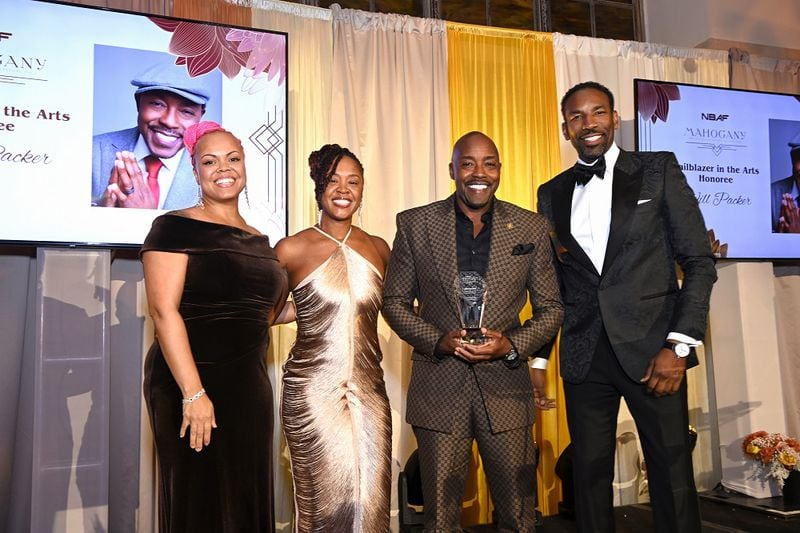 Oronike Odeleye (from left), Stephanie Owens, Will Packer and Mayor Andre Dickens attended the National Black Arts Festival in 2023. (Courtesy of Kim Evans/National Black Arts Festival) 