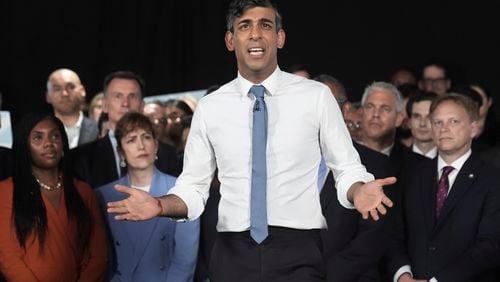 Britain's Prime Minister Rishi Sunak gestures during a General Election campaign event at ExCeL London, in east London, Wednesday May 22, 2024, after setting the date of July 4 for a national election in the UK. (Stefan Rousseau/PA via AP)