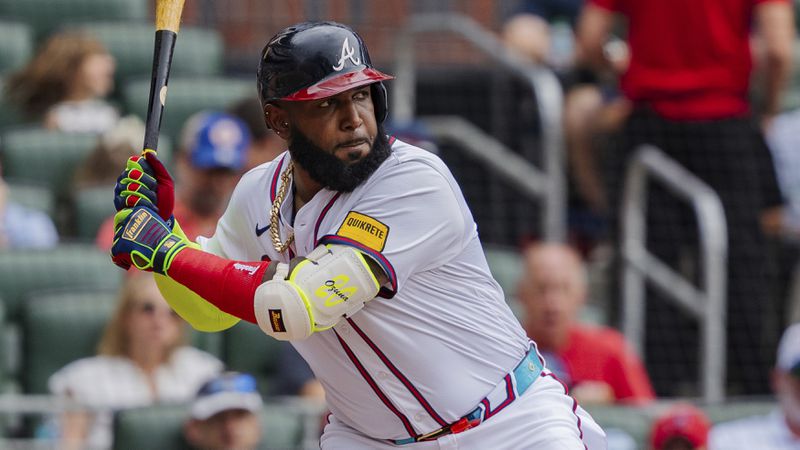 Atlanta Braves' Marcell Ozuna waits for the pitch in the fifth inning of a baseball game against the New York Mets, Monday, Sept. 30, 2024, in Atlanta. (AP Photo/Jason Allen)