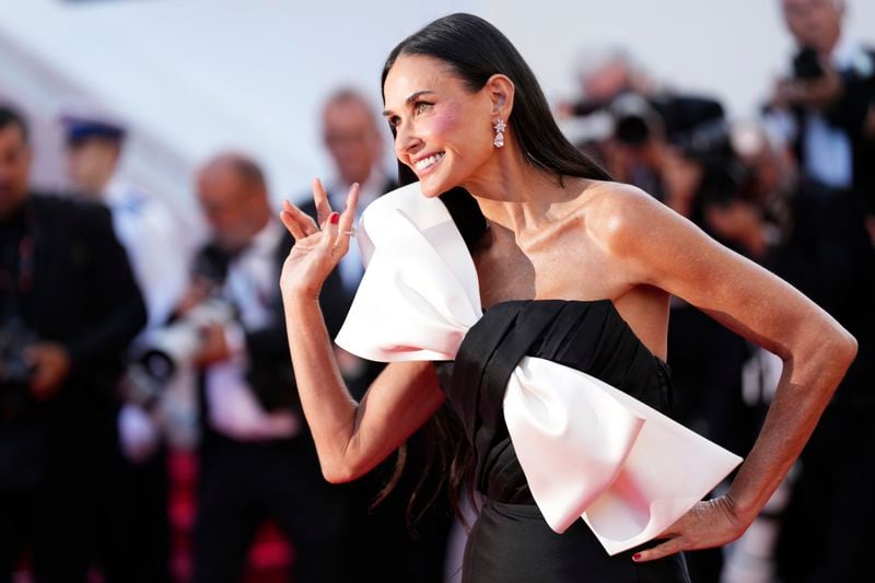 Demi Moore poses for photographers upon arrival at the awards ceremony during the 77th international film festival, Cannes, southern France, Saturday, May 25, 2024. (Photo by Scott A Garfitt/Invision/AP)