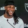 FILE - Las Vegas Raiders wide receiver Davante Adams (17) takes questions from the media after a NFL football training camp at Jack R. Hammett Sports Complex in Costa Mesa, Calif., July 24, 2024. (AP Photo/Damian Dovarganes, File)