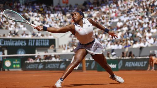 FILE - Coco Gauff of the U.S. plays a shot against Poland's Iga Swiatek during their semifinal match of the French Open tennis tournament at the Roland Garros stadium in Paris, Thursday, June 6, 2024. (AP Photo/Jean-Francois Badias, File)