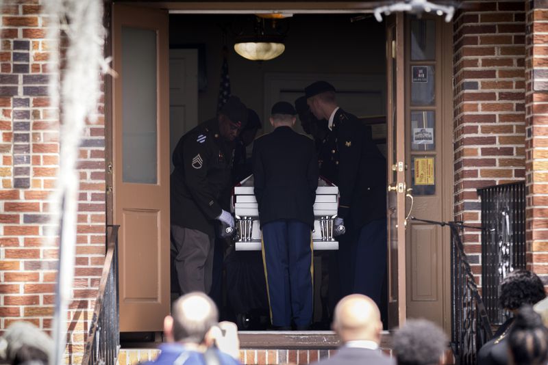 Pallbearers with the U.S. military carry the casket with the remains of U.S. Army Reservist Sgt. Breonna Moffett into the Campbell and Sons Funeral Home after a motorcade procession, Thursday, Feb. 15, 2024, Savannah, Ga. Moffett was killed in a drone attack in January along with two other U.S. servicemen in Jordan. (AJC Photo/Stephen B. Morton)