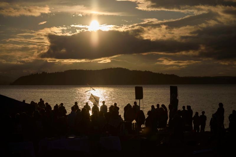 Attendees gather for a vigil on Alki Beach for the death of the 26-year old Aysenur Ezgi Eygi, killed recently in the occupied West Bank, Wednesday, Sept. 11, 2024, in Seattle. Eygi grew up in Seattle, attended Seattle Public Schools and graduated from the University of Washington. (AP Photo/John Froschauer)