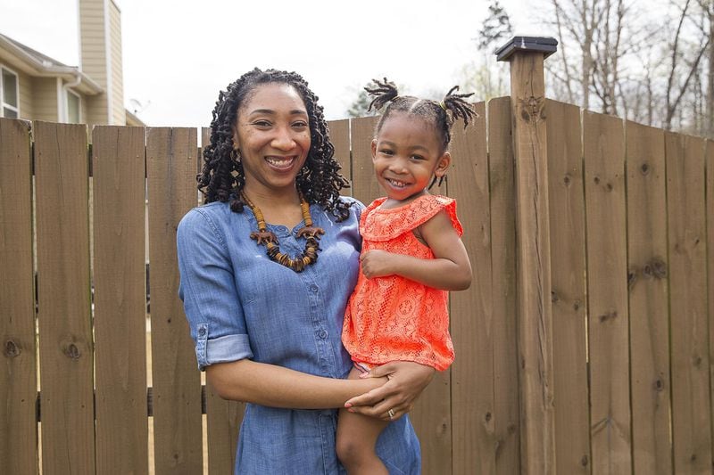 Yoga, a mostly plant-based diet, and an ability to put things in perspective have helped Phaedra Campbell of South Fulton stay grounded now that she has a daughter, Adrienne. ALYSSA POINTER / ALYSSA.POINTER@AJC.COM