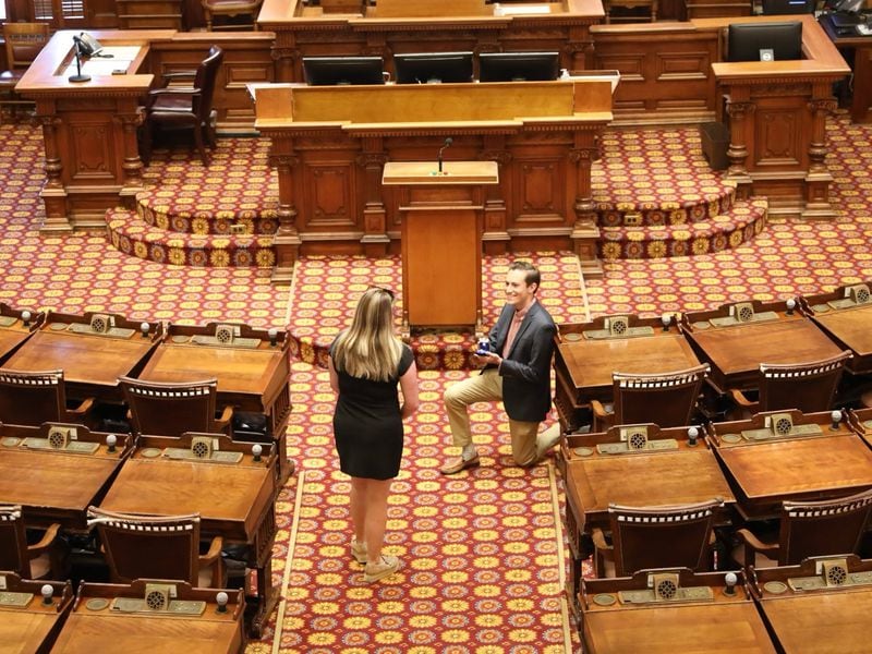 Sam West, top aide to House Majority Leader Chuck Efstration, proposed to Lauren Hunter on the House floor on their way to the Georgia-Clemson football game over the weekend. 