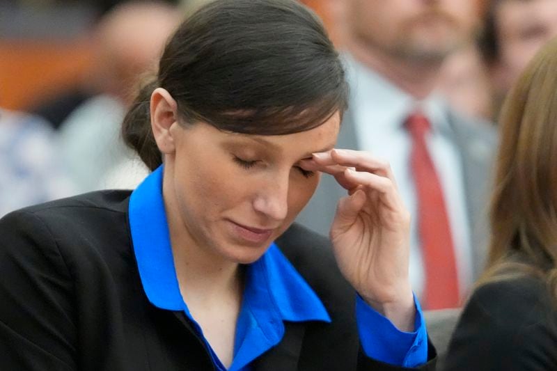 Kouri Richins, a Utah mother of three who wrote a children's book about coping with grief after her husband's death and was later accused of fatally poisoning him, looks on during a hearing Tuesday, Aug. 27, 2024, in Park City, Utah. (AP Photo/Rick Bowmer, Pool)