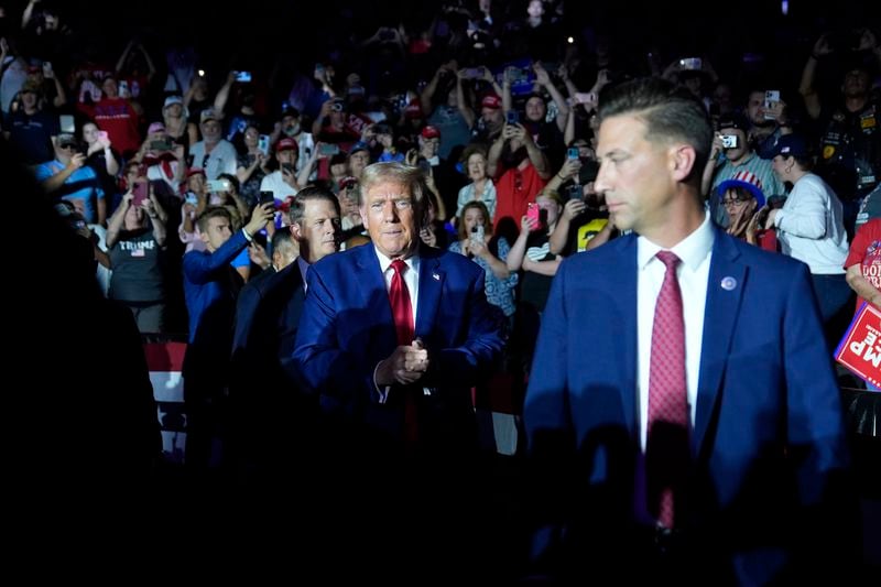 Republican presidential candidate former President Donald Trump is introduced for a town hall event at the Dort Financial Center, Tuesday, Sept. 17, 2024, in Flint, Mich. (AP Photo/Evan Vucci)