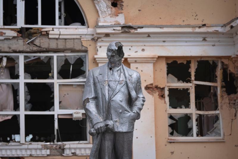 FILE - A damaged monument to Soviet founder Vladimir Lenin stands in a central square in Sudzha, Russia, on Aug. 16, 2024. This image was approved by the Ukrainian Defense Ministry before publication. (AP Photo, File)