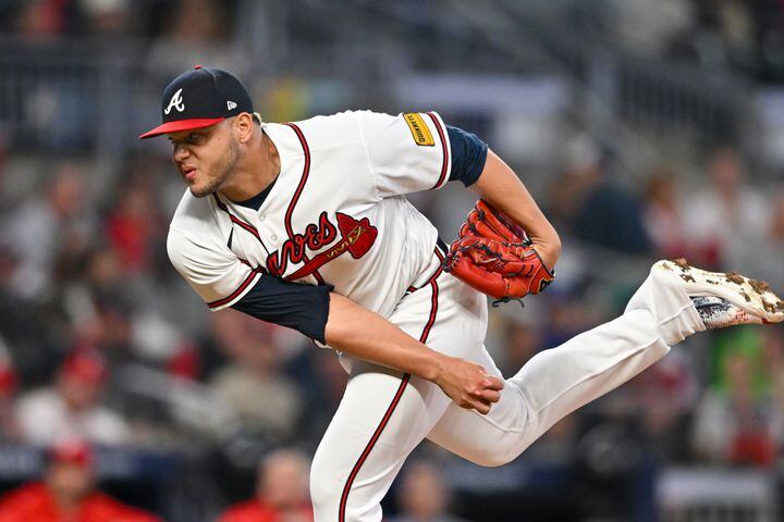 Atlanta Braves relief pitcher Joe Jimenez (77) delivers to the Philadelphia Phillies during the sixth inning of NLDS Game 2 in Atlanta on Monday, Oct. 9, 2023.   (Hyosub Shin / Hyosub.Shin@ajc.com)