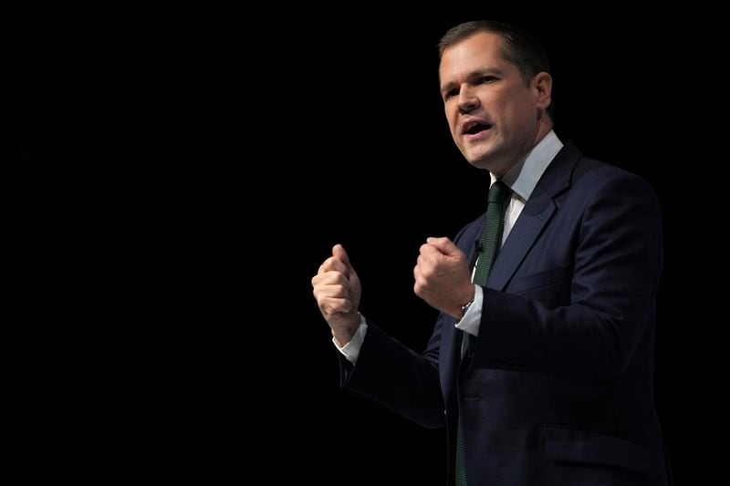 Conservative leadership candidate Robert Jenrick addresses members during the Conservative Party Conference at the International Convention Centre in Birmingham, England, Wednesday, Oct. 2, 2024.(AP Photo/Kin Cheung)