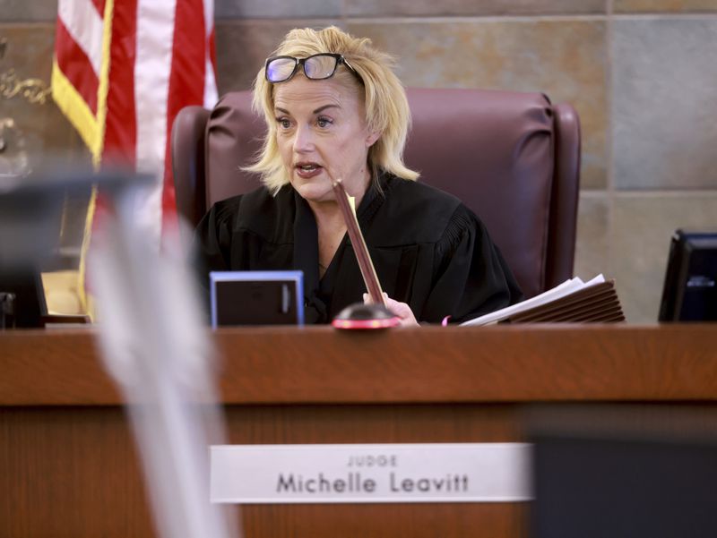 District Judge Michelle Leavitt talks to attorneys during jury selection in the murder trial of Robert Telles at the Regional Justice Center in Las Vegas, Monday, Aug. 12, 2024. Telles, a former Clark County public administrator, is accused of killing Las Vegas Review-Journal investigative journalist Jeff German. (K.M. Cannon/Las Vegas Review-Journal via AP, Pool)