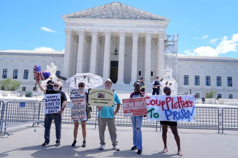 People protest outside the Supreme Court Monday, July 1, 2024, in Washington. (AP Photo/Mariam Zuhaib)