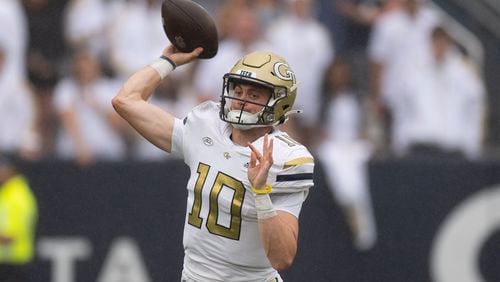 Georgia Tech quarterback Haynes King (10) throws on the run during the first half of a NCAA college football game against Virginia Military Institute Saturday, Sept. 14, 2024, in Atlanta. (AP Photo/John Bazemore)