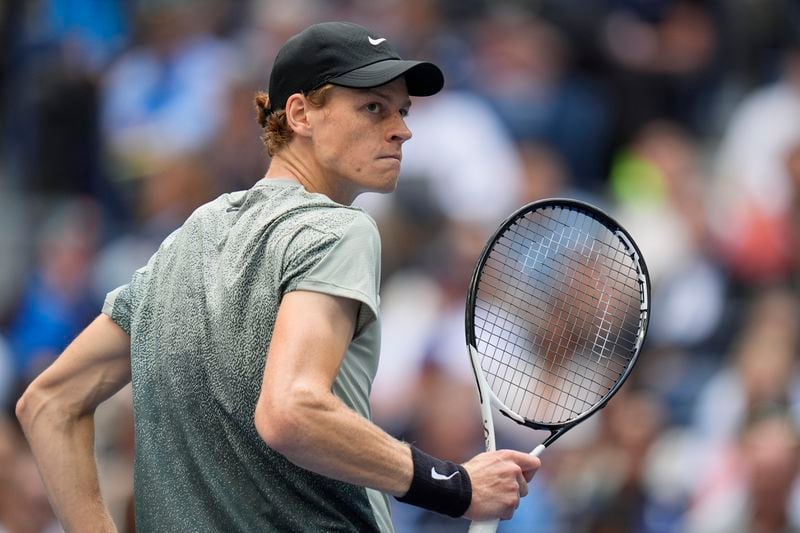 Jannik Sinner, of Italy, reacts after winning a game against Taylor Fritz, of the United States, during the men's singles final of the U.S. Open tennis championships, Sunday, Sept. 8, in New York. 2024. (AP Photo/Seth Wenig)