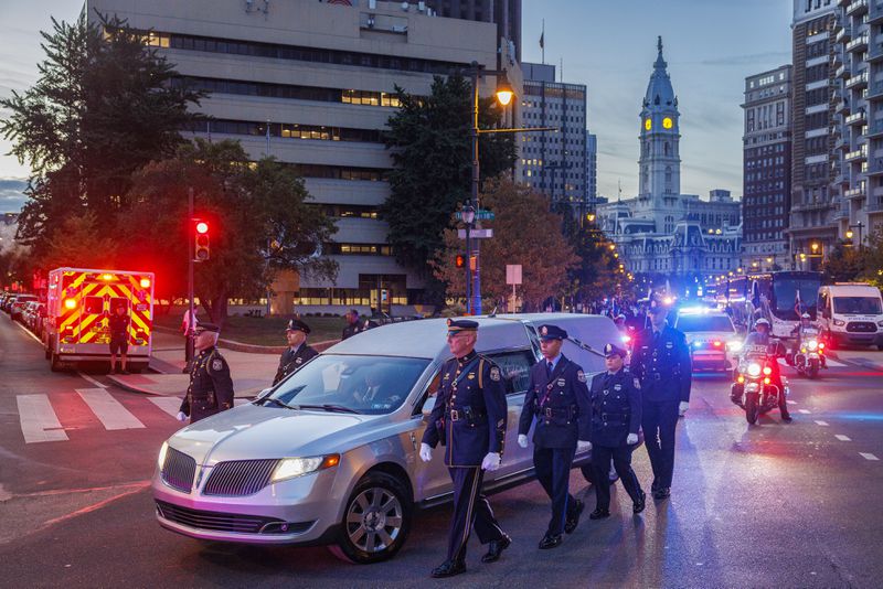 Funeral procession for Philadelphia police officer Jaime Roman in route to the Cathedral Basilica of Saints Peter and Paul on Thursday, Sept. 19, 2024. (Alejandro A. Alvarez/The Philadelphia Inquirer via AP)