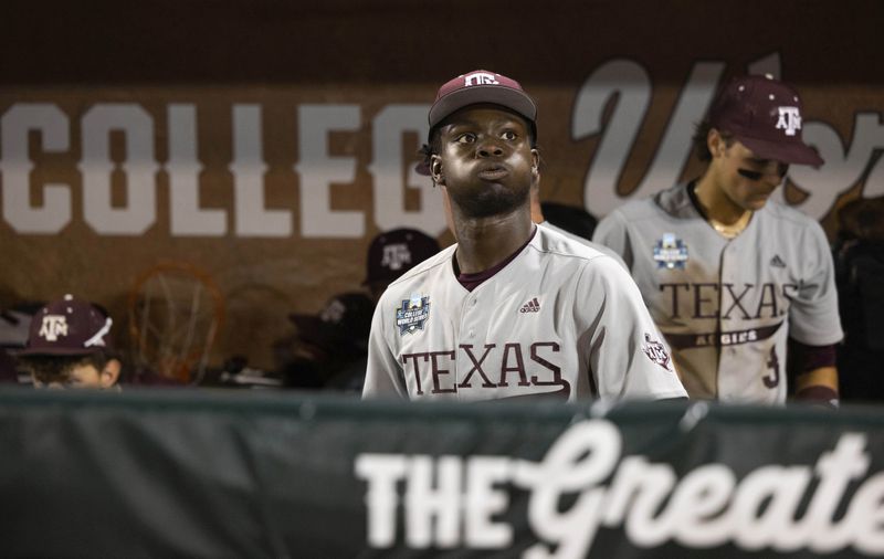 Texas A&M's Eldridge Armstrong III reacts after his team's loss to Tennessee in Game 3 of the NCAA College World Series baseball finals in Omaha, Neb., Monday, June 24, 2024. (AP Photo/Rebecca S. Gratz)