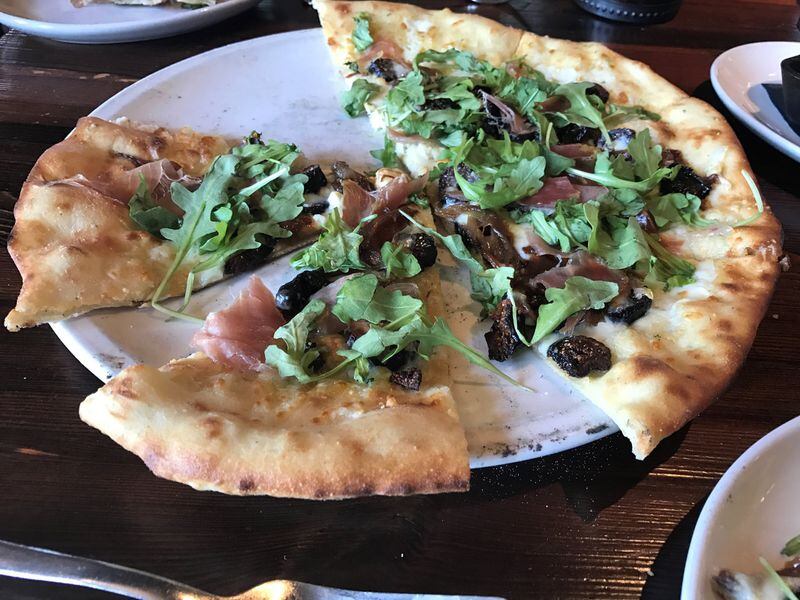 Figs are among those foods considered to have aphrodisiac qualities. Figs are the focal on the fig pizza at Fire Stone Wood Fired & Pizza Grill in Woodstock. The pie is also topped with a shallot marmalade, prosciutto, mozzarella and blue cheeses and fresh arugula. LIGAYA FIGUERAS / LFIGUERAS@AJC.COM