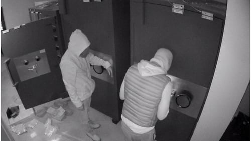 Atlanta police are looking for two masked gunmen who stole from the Icebox jewelry store in Buckhead as shown in this still image from store surveillance footage.