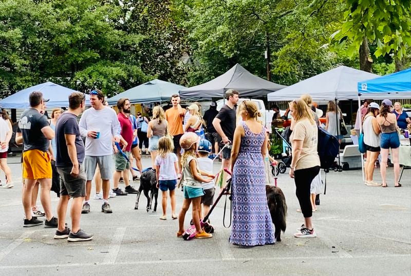Shoppers gather to catch up in the middle of the Sunday afternoon 2023 Reynoldstown Farmers Market. (Courtesy of Carmen Samanes)