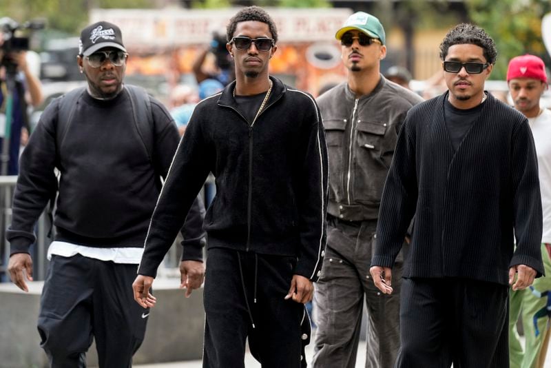 From right, Justin Dior Combs, Quincy Brown and King Combs, arrive at Manhattan federal court, Tuesday, Sept. 17, 2024, in New York. (AP Photo/Seth Wenig)